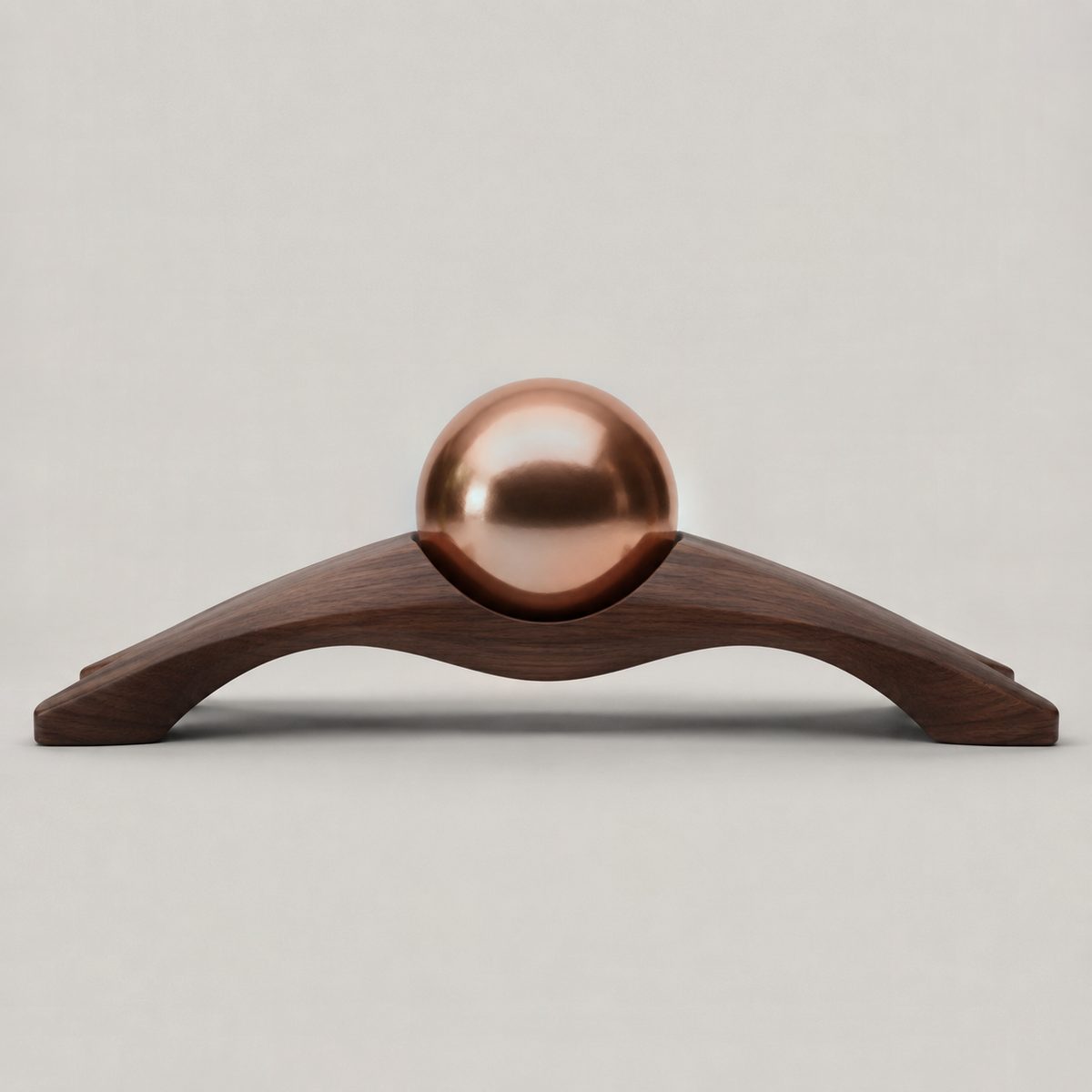 Span, ARKA I: 1 × 50 mm copper spheres resting in seats carved into a walnut form